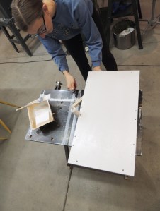 Painted under bed divider, driver side under bed storage partition, forward bench riser, and lithium battery tray