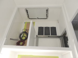 Test fit, masked, prepped, and bonded under bed divider and storage partition