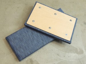 Upholstered and assembled seat bases