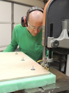 Upholstered and assembled seat bases