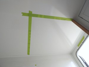 Cut, fit, and installed shower curtain track over shower