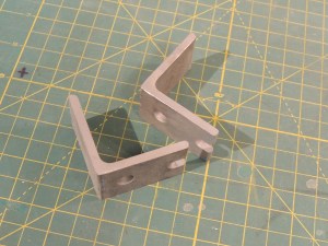 Fabricated under subframe storage box lock plates