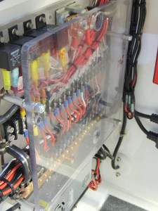 Installed electrical distribution panel polycarbonate shield