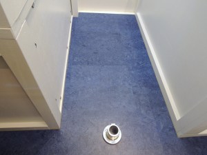 Mounted table leg socket to floor of habitat