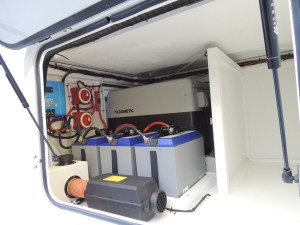 Picked location for overhead storage bins on bottom of bed deck