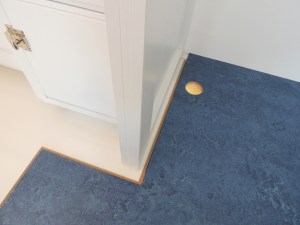 Started installation of marmoleum flooring