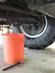 Drained engine oil, transmission fluid, and differential oil