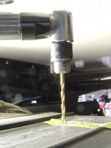 Drilled holes in fuel tank for heater and fuel heater fuel supply