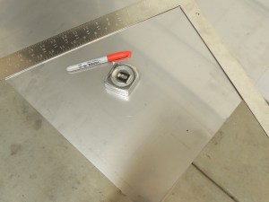 Fabricated stainless steel rear wheel shield plates