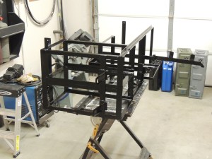 Prepped, seam sealed, primed, and painted under subframe storage box mount