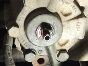 Removed power steering adjustment jam nut and cleaned threads