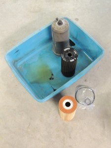 Replaced oil filter and filled engine with oil (Rotella 15W-40)