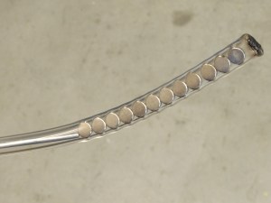 Used magnets inside tubing to remove any metal particles from inside tank