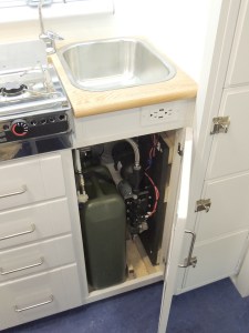 Wired and plumbed final water pump assembly