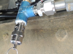 Added pressure relief valve to electric air compressor manifold