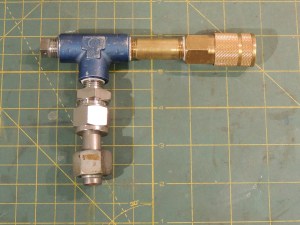 Bench assembled electric air compressor to truck manifold