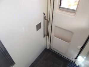 Bonded passthrough door bump stop