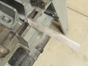 Fabricated bracket assembly for entry door hold open catch