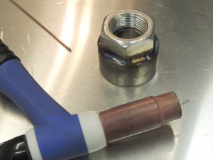 Fabricated hall effect sensor mount for speedometer sending unit