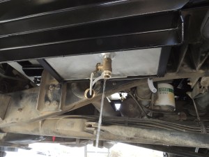 Filled and test drained gray water tank system