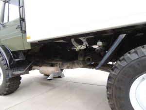 Installed driver side under subframe mount, storage boxes, Jerry cans, and gray water tank