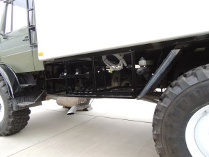 Installed driver side under subframe mount, storage boxes, Jerry cans, and gray water tank