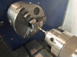 Machined and welded portal tank dipstick pins