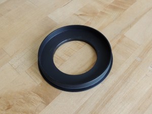 Machined new Delrin bezel for fitting new speedometer in old dash panel hole