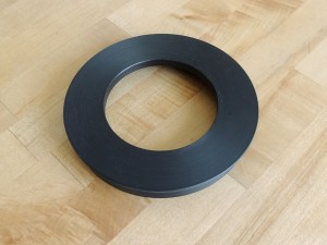 Machined new Delrin bezel for fitting new speedometer in old dash panel hole