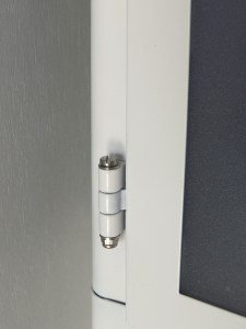 Replaced cabinet hinge pins with small stainless steel bolts and lock nuts